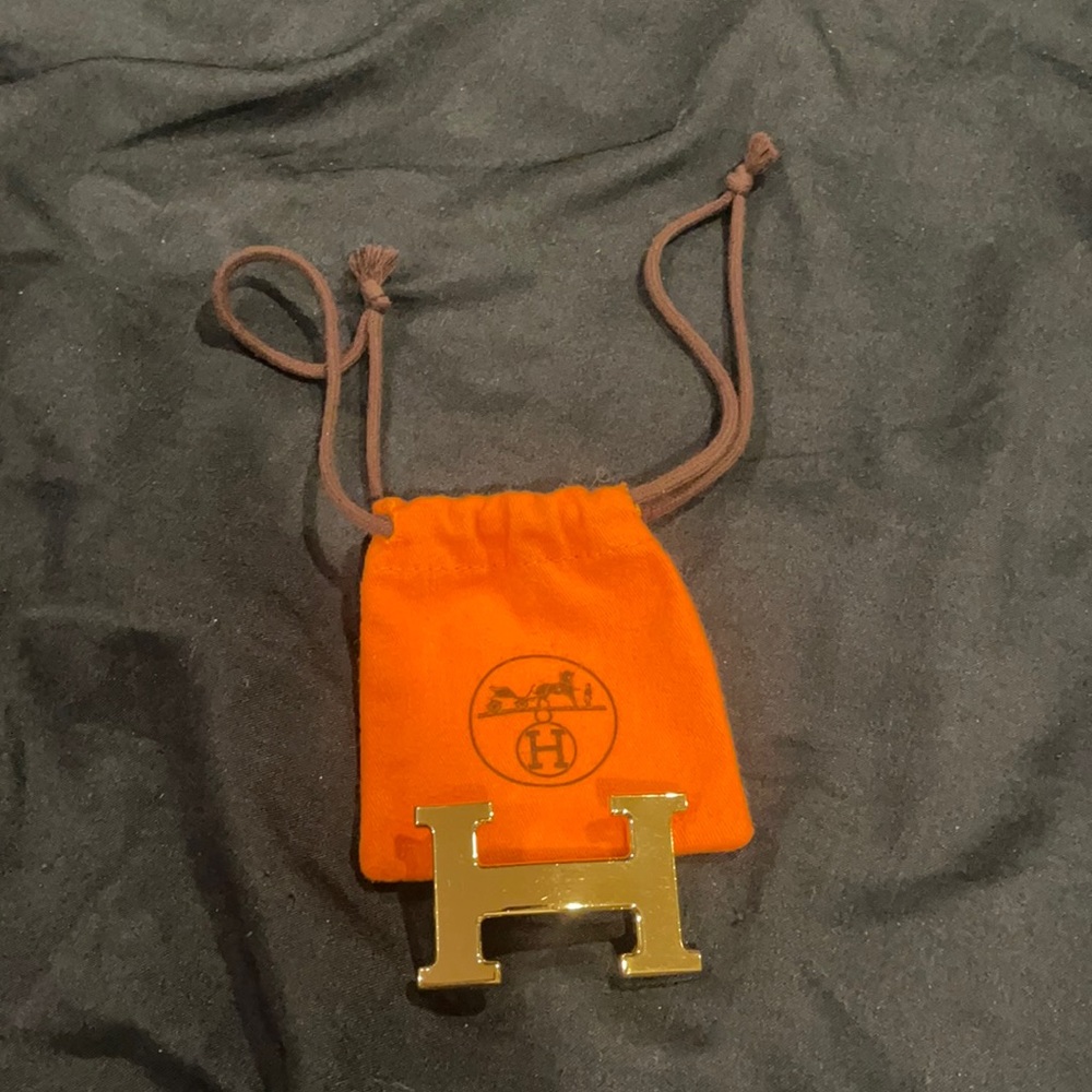 Hermès reversible Gold buckle with black and blue options -